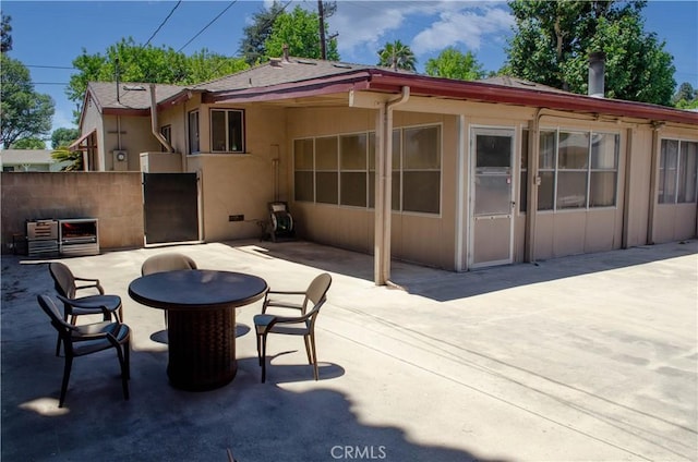 10520 Haskell Ave, Granada Hills, CA 91344 - rear view of house featuring a patio area and stucco siding