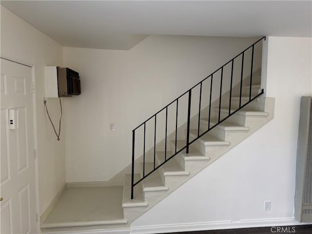 1164 Irving Ave, Glendale, CA 91201 - stairs with a heating unit and an AC wall unit