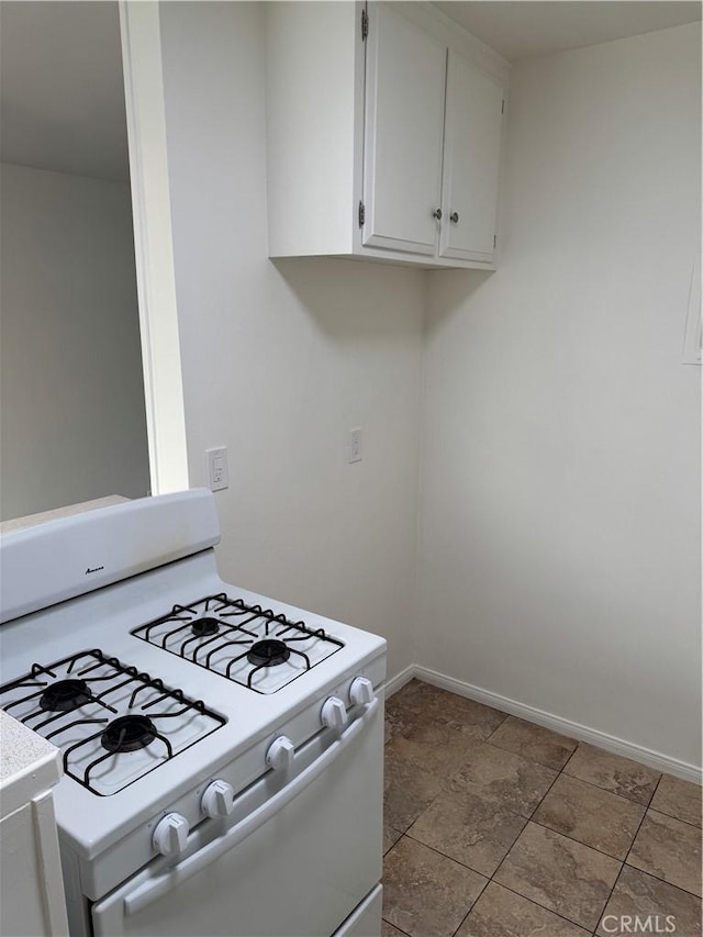 1164 Irving Ave, Glendale, CA 91201 - kitchen featuring white range with gas stovetop, white cabinets, and light countertops