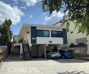 1164 Irving Ave, Glendale, CA 91201 - view of building exterior with stairs and concrete driveway
