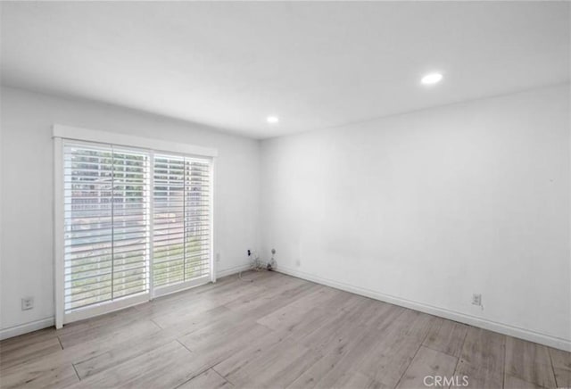 7915 Helena Ave, Riverside, CA 92504 - unfurnished room featuring wood finished floors and recessed lighting