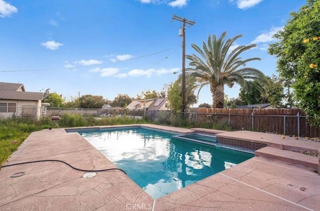 7915 Helena Ave, Riverside, CA 92504 - view of pool with a jacuzzi, a fenced backyard, and a patio area