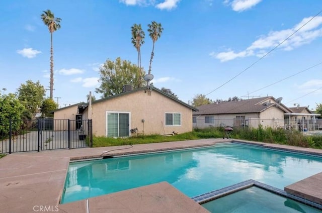 7915 Helena Ave, Riverside, CA 92504 - view of swimming pool featuring a pool with connected hot tub