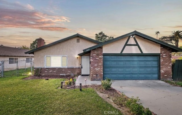 7915 Helena Ave, Riverside, CA 92504 - view of front of house featuring stucco siding, brick siding, concrete driveway, an attached garage, and a chimney