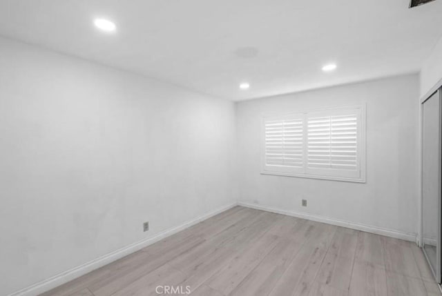 7915 Helena Ave, Riverside, CA 92504 - empty room with light wood-style flooring and recessed lighting