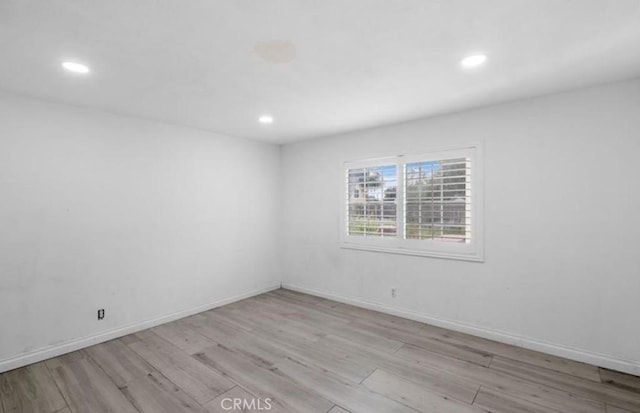 7915 Helena Ave, Riverside, CA 92504 - empty room featuring light wood finished floors and recessed lighting