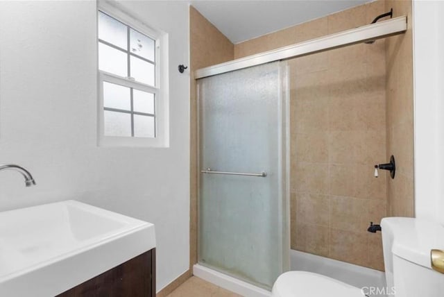 7915 Helena Ave, Riverside, CA 92504 - full bath featuring a shower stall, vanity, and tile patterned floors