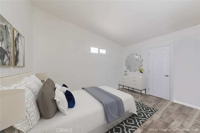 110 S Baymar St, West Covina, CA 91791 - bedroom featuring vaulted ceiling and wood finished floors
