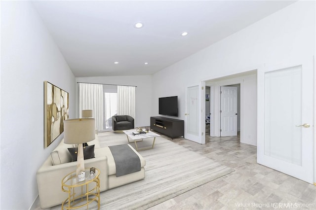 110 S Baymar St, West Covina, CA 91791 - living area featuring lofted ceiling, recessed lighting, and wood finished floors