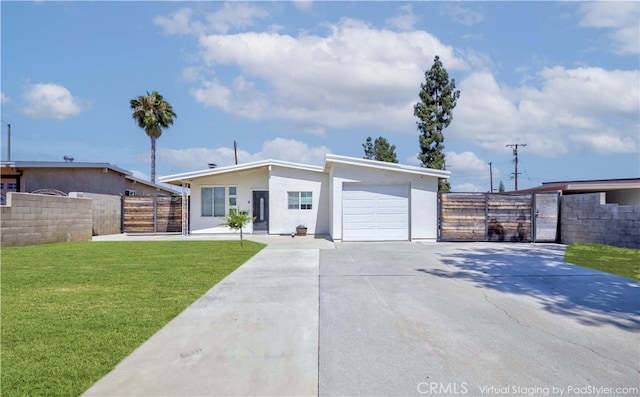 110 S Baymar St, West Covina, CA 91791 - mid-century inspired home featuring concrete driveway, a gate, stucco siding, and an attached garage