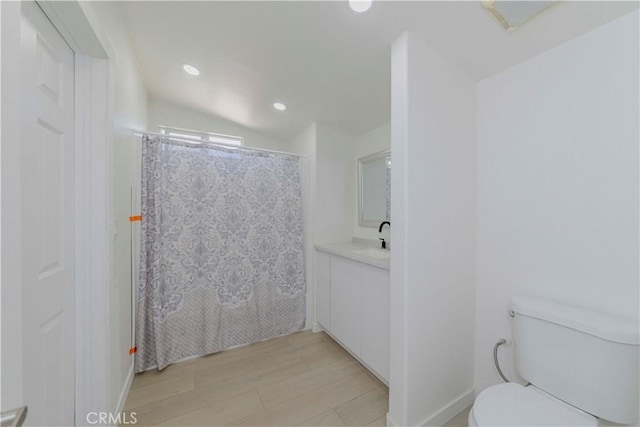 110 S Baymar St, West Covina, CA 91791 - full bathroom with vanity, recessed lighting, a shower with curtain, and wood finished floors