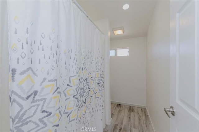 110 S Baymar St, West Covina, CA 91791 - bathroom with wood finished floors and a shower with curtain