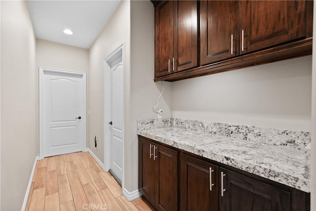 1018 W 15th St, Upland, CA 91786 - laundry room featuring light wood finished floors and recessed lighting
