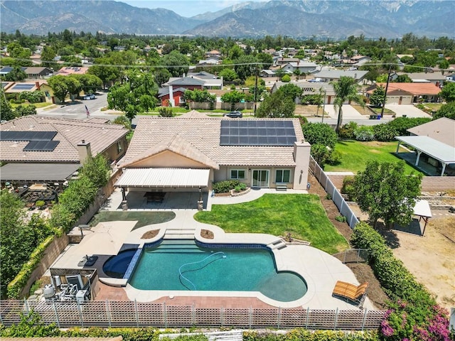 1018 W 15th St, Upland, CA 91786 - view of pool featuring a fenced backyard, a residential view, a mountain view, and a patio