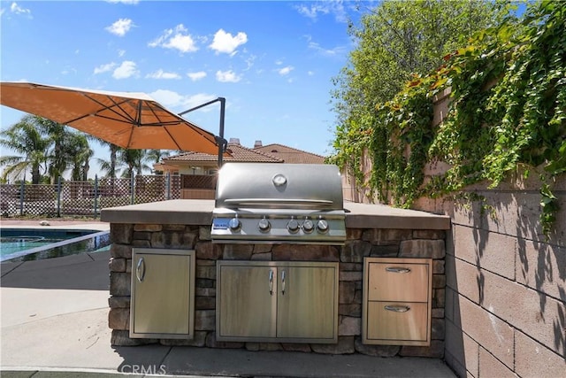 1018 W 15th St, Upland, CA 91786 - view of patio featuring exterior kitchen
