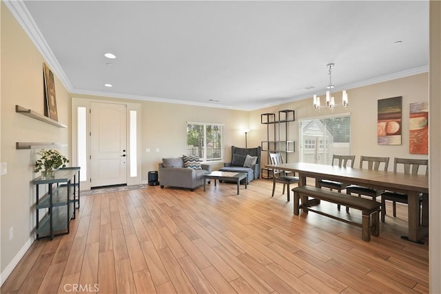 1018 W 15th St, Upland, CA 91786 - living area with a chandelier, light wood-style floors, crown molding, and recessed lighting