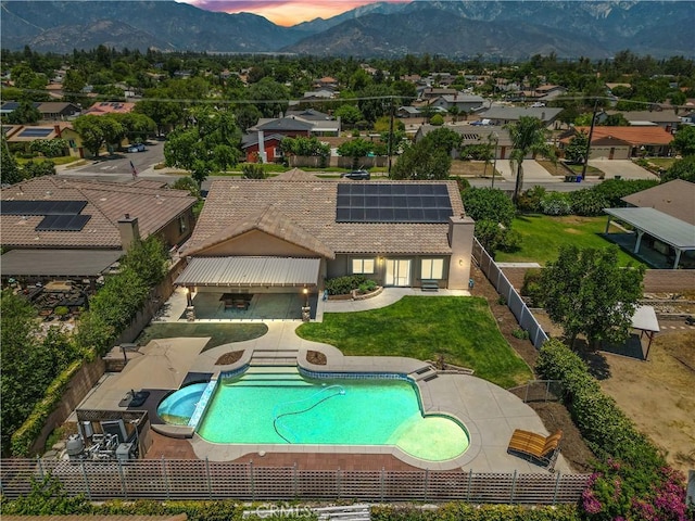 1018 W 15th St, Upland, CA 91786 - view of pool featuring a fenced backyard, a pool with connected hot tub, a patio area, a mountain view, and a residential view