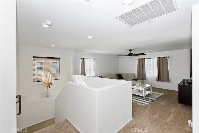 12465 Gramercy Ln, Victorville, CA 92392 - carpeted living area featuring healthy amount of natural light, recessed lighting, and ceiling fan