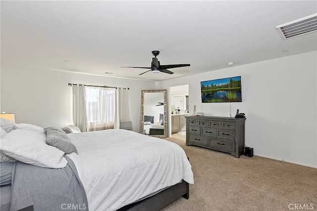 12465 Gramercy Ln, Victorville, CA 92392 - bedroom featuring light carpet, ceiling fan, and connected bathroom