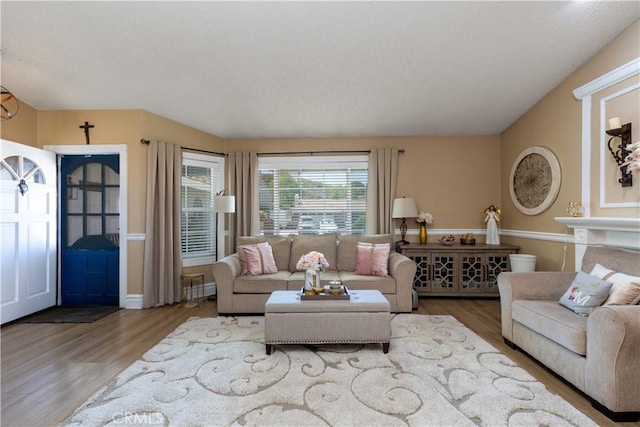 28219 Langside Ave, Canyon Country, CA 91351 - living room featuring wood finished floors and a textured ceiling
