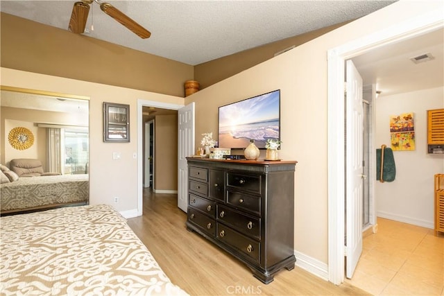 28219 Langside Ave, Canyon Country, CA 91351 - bedroom with light wood-style flooring and a ceiling fan