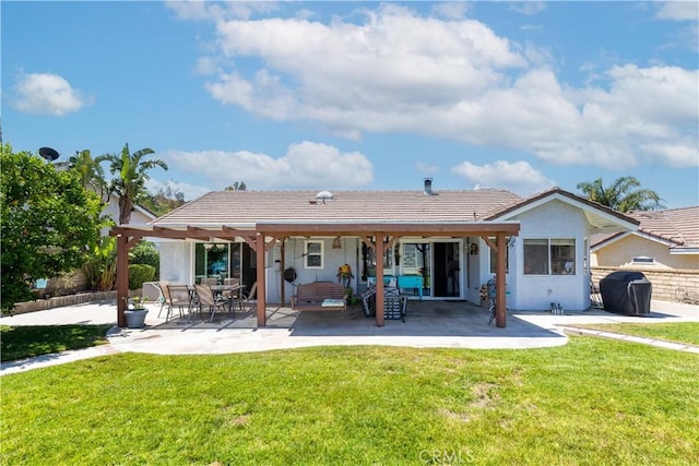 28219 Langside Ave, Canyon Country, CA 91351 - back of property with a patio area, stucco siding, a yard, and a tile roof