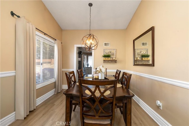 28219 Langside Ave, Canyon Country, CA 91351 - dining space with light wood-style floors and a chandelier