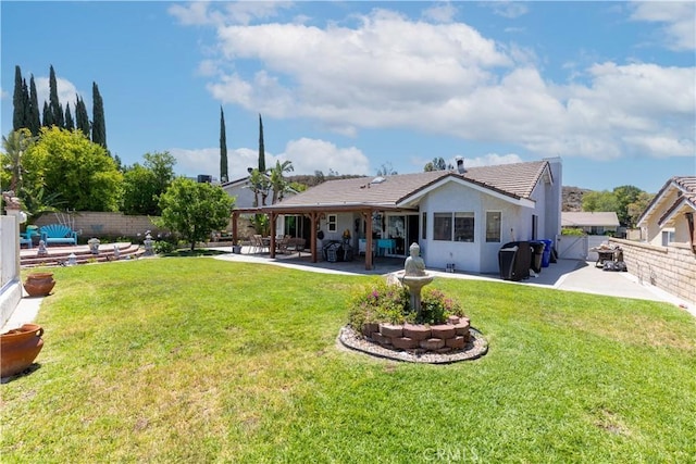 28219 Langside Ave, Canyon Country, CA 91351 - rear view of property with a patio, a fenced backyard, stucco siding, and a tile roof