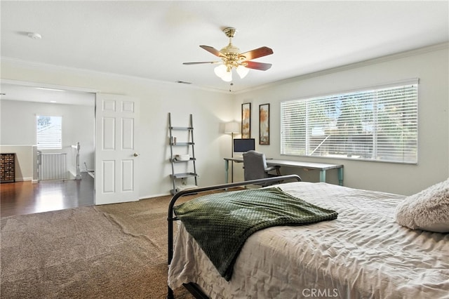 16074 Coyote Springs Ct, Moreno Valley, CA 92551 - carpeted bedroom with crown molding and a ceiling fan