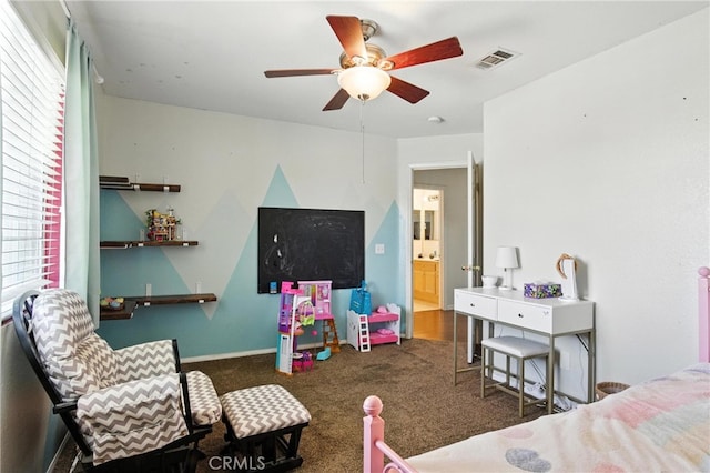 16074 Coyote Springs Ct, Moreno Valley, CA 92551 - bedroom with carpet floors, multiple windows, and a ceiling fan