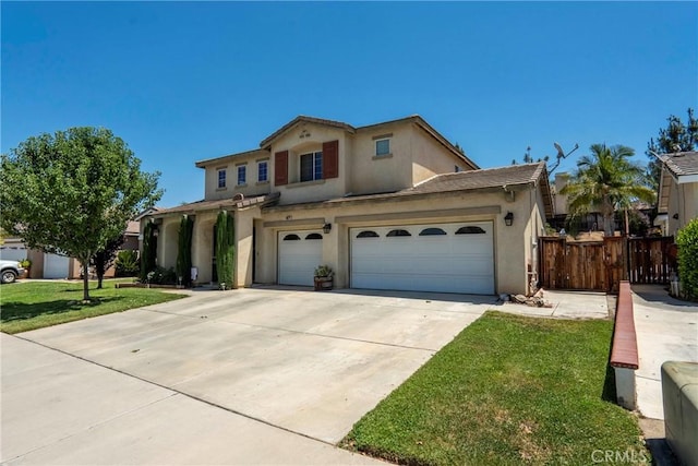 16074 Coyote Springs Ct, Moreno Valley, CA 92551 - view of front of house featuring stucco siding, driveway, and an attached garage