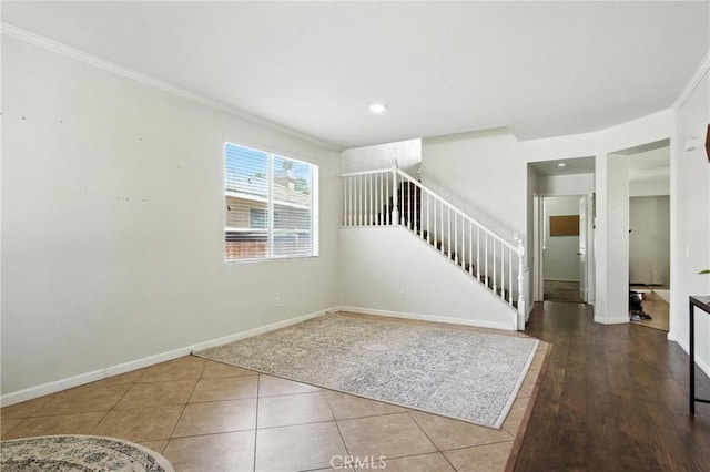 16074 Coyote Springs Ct, Moreno Valley, CA 92551 - entryway featuring ornamental molding, stairway, and tile patterned floors