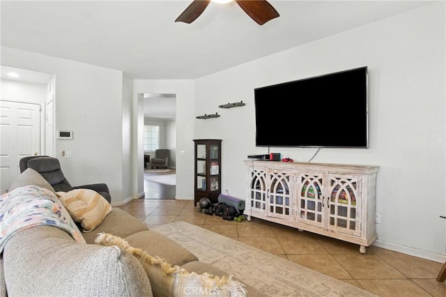 16074 Coyote Springs Ct, Moreno Valley, CA 92551 - tiled living area with ceiling fan and baseboards