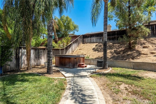 16074 Coyote Springs Ct, Moreno Valley, CA 92551 - fenced backyard with a hot tub