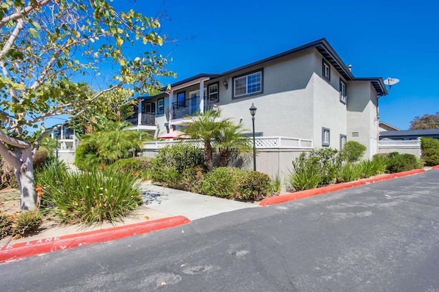 506 Canyon Dr Unit 70, Oceanside, CA 92054 - view of front facade with stucco siding