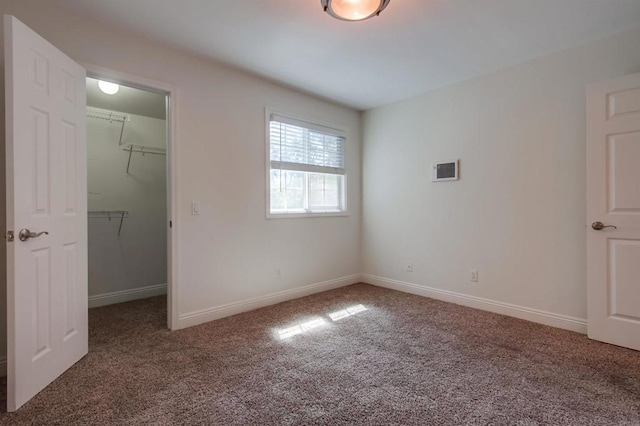 506 Canyon Dr Unit 70, Oceanside, CA 92054 - unfurnished bedroom featuring carpet floors and a spacious closet