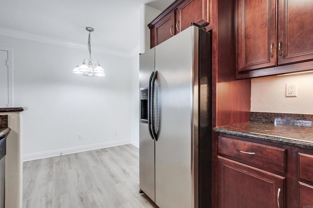 506 Canyon Dr Unit 70, Oceanside, CA 92054 - kitchen with stainless steel refrigerator with ice dispenser, a chandelier, ornamental molding, light wood-type flooring, and decorative light fixtures