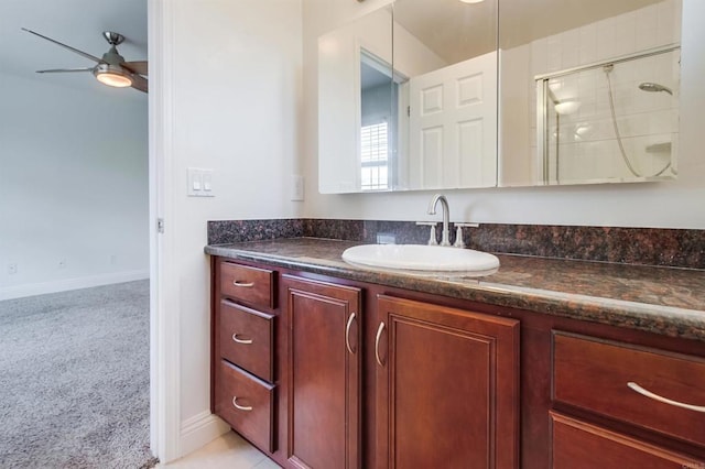 506 Canyon Dr Unit 70, Oceanside, CA 92054 - full bathroom with vanity, ceiling fan, and tiled shower