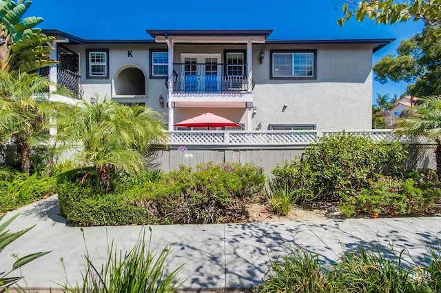 506 Canyon Dr Unit 70, Oceanside, CA 92054 - mediterranean / spanish-style home featuring a balcony and stucco siding
