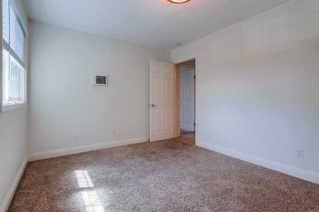 506 Canyon Dr Unit 70, Oceanside, CA 92054 - empty room with carpet flooring and baseboards