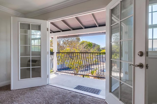 506 Canyon Dr Unit 70, Oceanside, CA 92054 - entryway with healthy amount of natural light, crown molding, and carpet