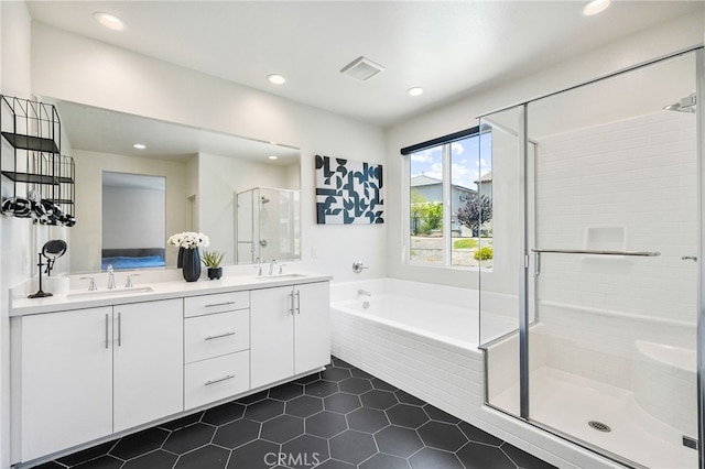 28508 Daybreak Way, Saugus, CA 91350 - full bathroom featuring a shower stall, a bath, recessed lighting, double vanity, and tile patterned floors