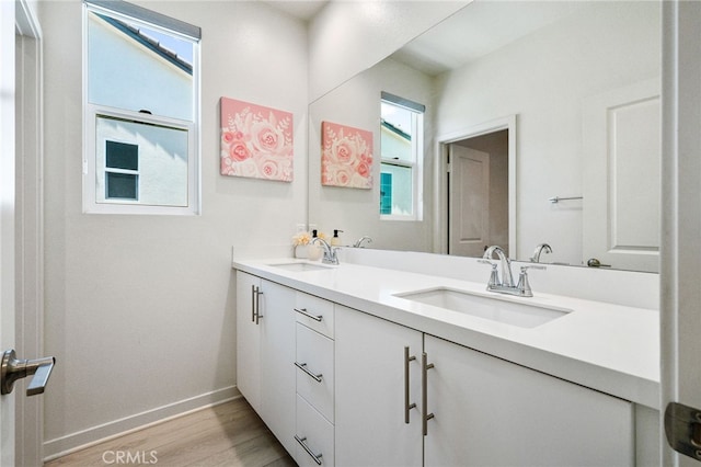 28508 Daybreak Way, Saugus, CA 91350 - bathroom with double vanity and wood finished floors