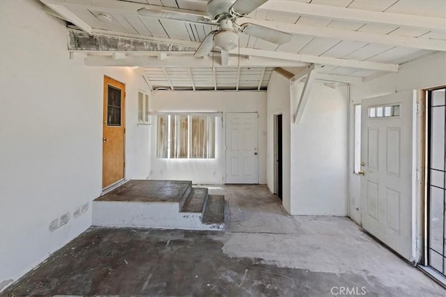 24976 7th St, San Bernardino, CA 92410 - foyer entrance with a wood ceiling with exposed beams, a ceiling fan, and concrete flooring