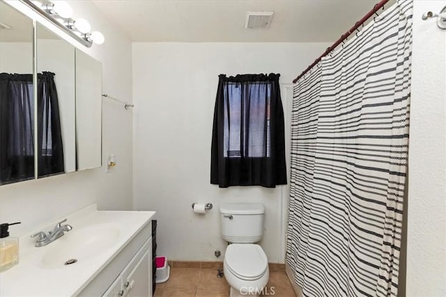 24976 7th St, San Bernardino, CA 92410 - full bathroom with vanity, tile patterned flooring, and a shower with shower curtain