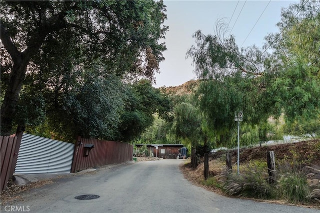 24058 Eagle Mountain St, West Hills, CA 91304 - view of asphalt driveway