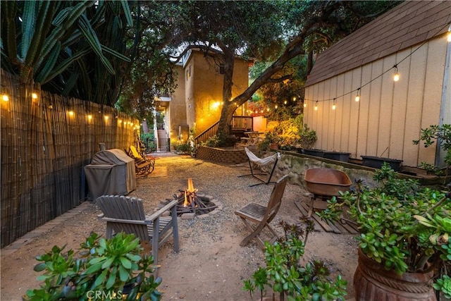 24058 Eagle Mountain St, West Hills, CA 91304 - view of patio / terrace featuring a fire pit
