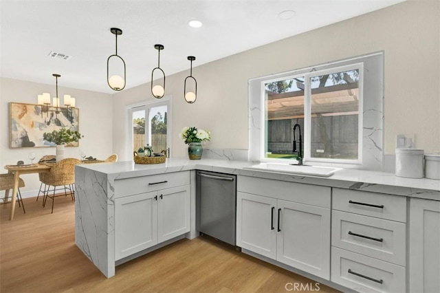 10965 Canis Ln, San Diego, CA 92126 - kitchen with dishwasher, light wood-type flooring, a peninsula, light stone counters, and recessed lighting