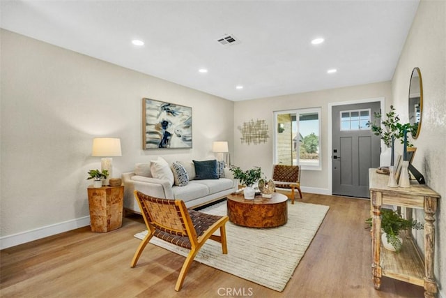 10965 Canis Ln, San Diego, CA 92126 - living area featuring light wood finished floors and recessed lighting