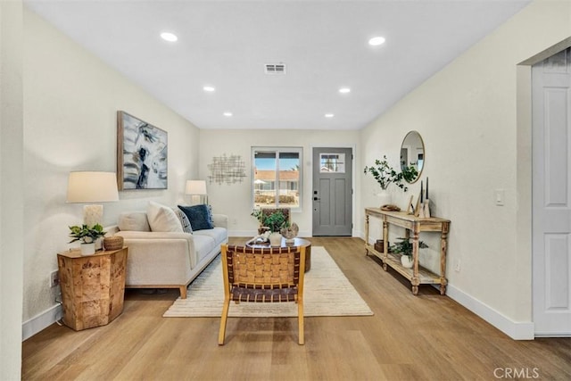 10965 Canis Ln, San Diego, CA 92126 - living area featuring wood finished floors and recessed lighting